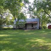 Historical Farm House with Modern Day Home on Property
