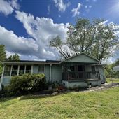 Old junkyard house and shop on 11 acres