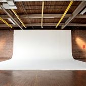 Ambient+Studio: Industrial Studio with Huge Windows