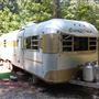 1973 Silver Streak Continental in a wooded setting