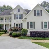 White-Washed Brick Home with Lovely Garden