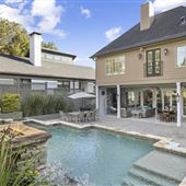 Open Outdoor Living with Lush Backyard Oasis