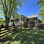 Gorgeous Country Home on acreage with pond and barns