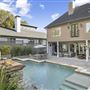 Open Outdoor Living with Lush Backyard Oasis