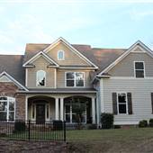 9 ACRE WOODED LAKE HOME