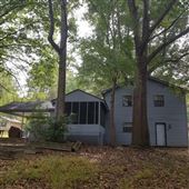 1980s - 2000s Suburban cape cod style home