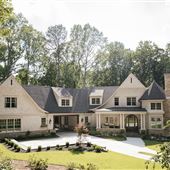 One of a kind custom home on quiet 3-acre wooded lot