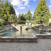 Open Outdoor Living with Lush Backyard Oasis