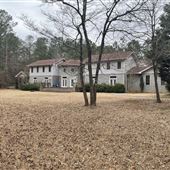 Unique, large home on 40 private acres