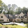 One of a kind custom home on quiet 3-acre wooded lot
