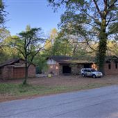 Burned House Brick Ranch (Gutted) With Detached Garage in Conyers