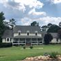 Tropical River’s Edge with Country Porch