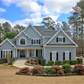 Large Updated house, GIANT kitchen island,  with a pool on the lake and golf cart paths!