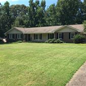 Ranch Style House and Wooded Lot
