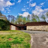 Vacant 1970's Style Homes with large garage and barn on 5 acres of land
