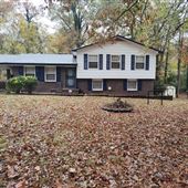 Tri-level brick on 3 acres