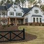 Modern open farmhouse with woods, pool, and bar