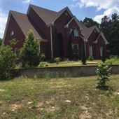 Large Home Off a Dirt Road