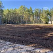13+ acres, mostly wooded with acre clearing