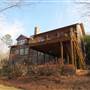 Large log home located on Apalachee River in rural Walton County