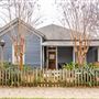 Urban early 1900's Cabbagetown wood siding home with porch