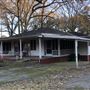 Timeworn Home with adjacent properties on dead end street