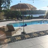 Lake Spivey Jonesboro with a pool. On water.