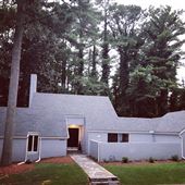 Stately Midcentury Modern Home with Panoramic views of Heavily Wooded Estate