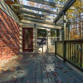 Private wooded home with tennis court in Sandy Springs!