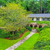 Private residence with veranda, gazebo, waterfall, pond, and secret garden
