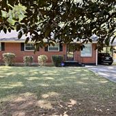 EAST POINT- Beautiful humble rich red brick ranch home built in 1958, 1354 sq feet in a friendly neighborhood with hardwood floors, back yard, deck and sunroom