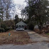 Cottage house on 1/2 acre with brick terraces