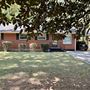 EAST POINT- Beautiful humble rich red brick ranch home built in 1958, 1354 sq feet in a friendly neighborhood with hardwood floors, back yard, deck and sunroom
