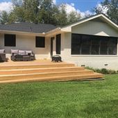 Updated farmhouse w/ sprawling green space, outdoor living area, view of pastures and horses