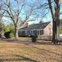 Renovated gated brick home on 5 acres